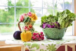 Fresh vegetables in a bright kitchen window